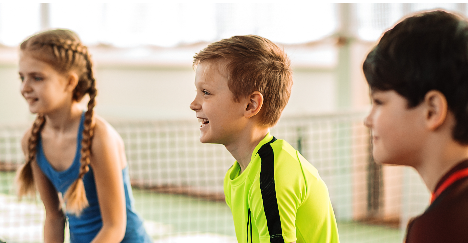 children playing tennis