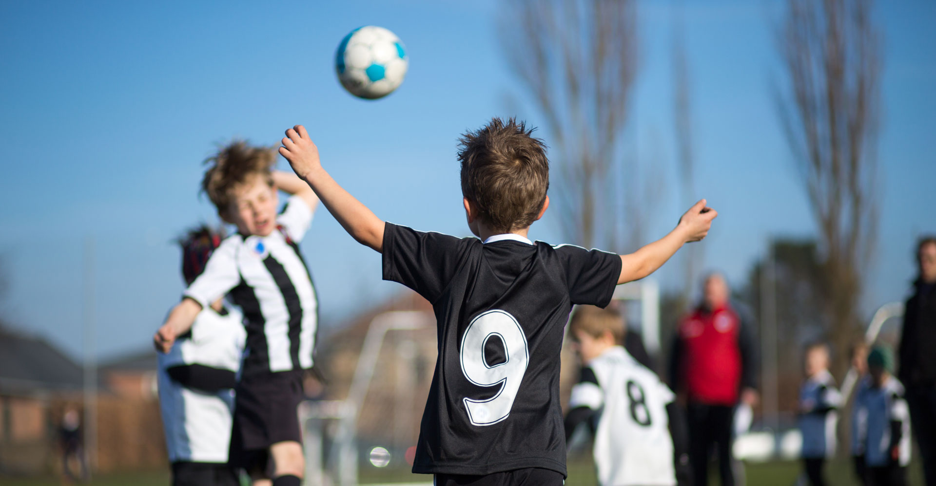 Boys playing football