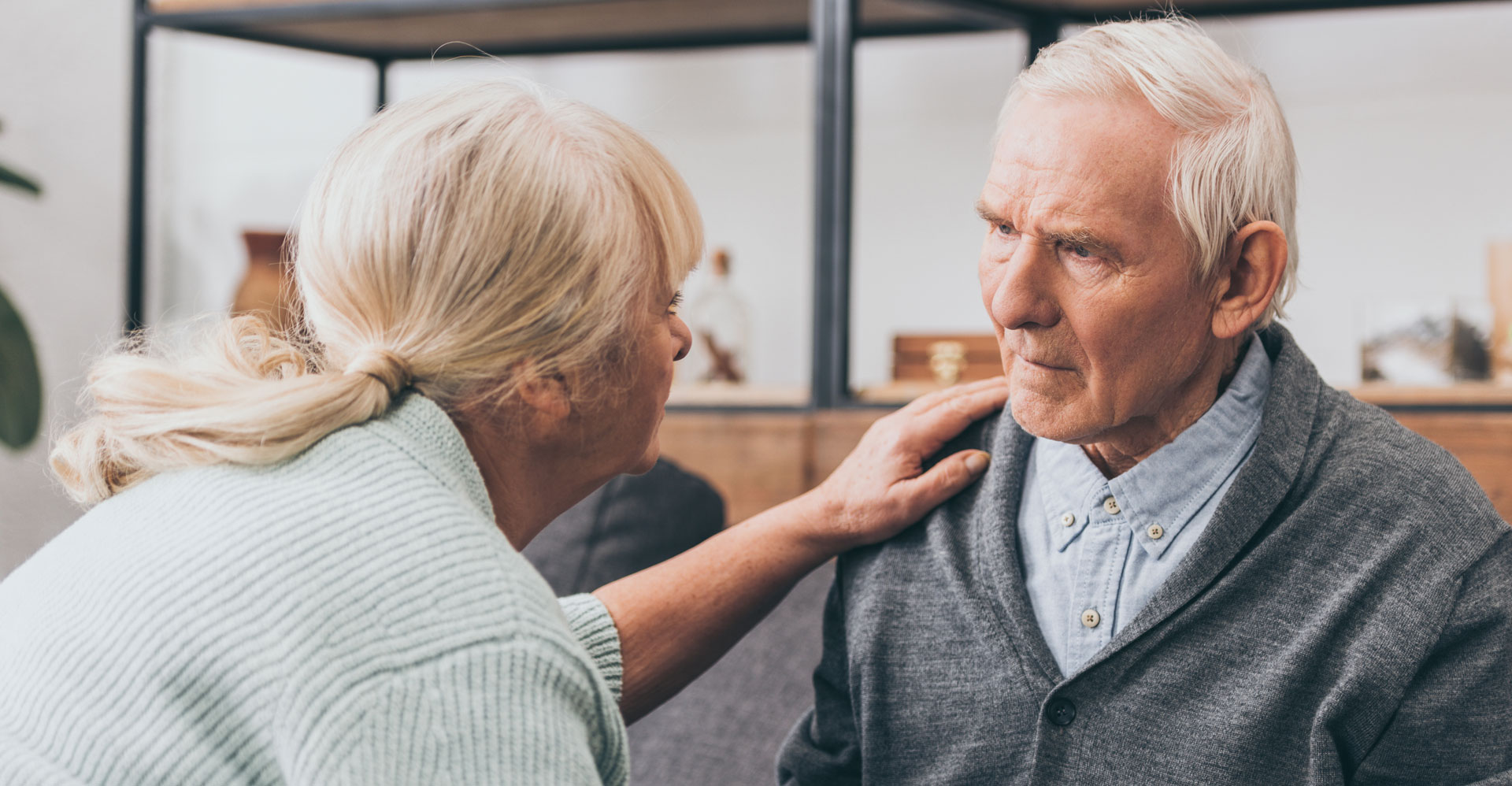 lady caring for elderly gentleman