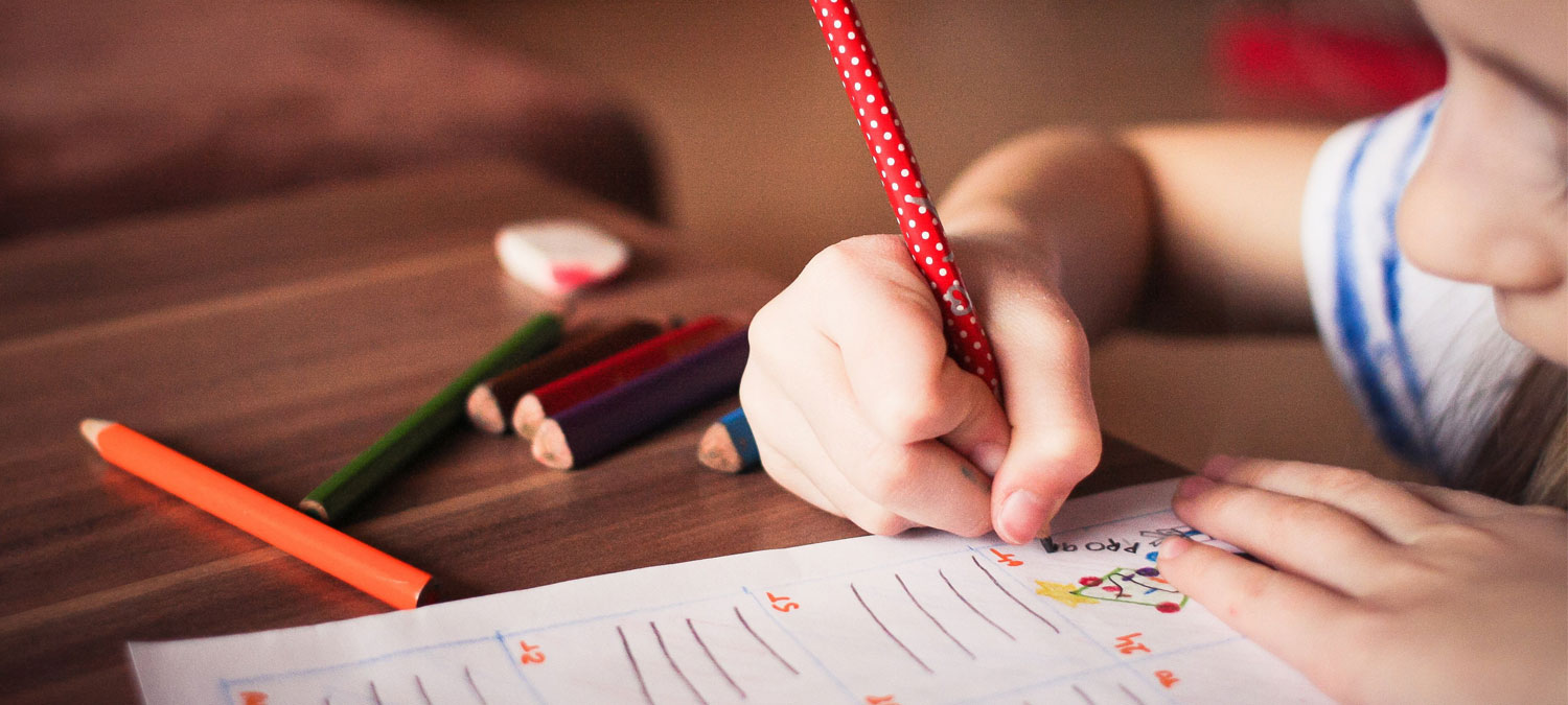 child doing home work