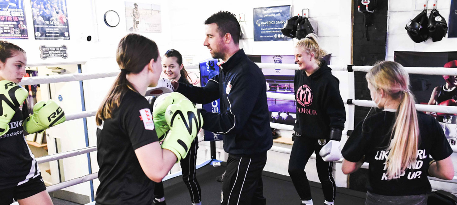 girls getting boxing training