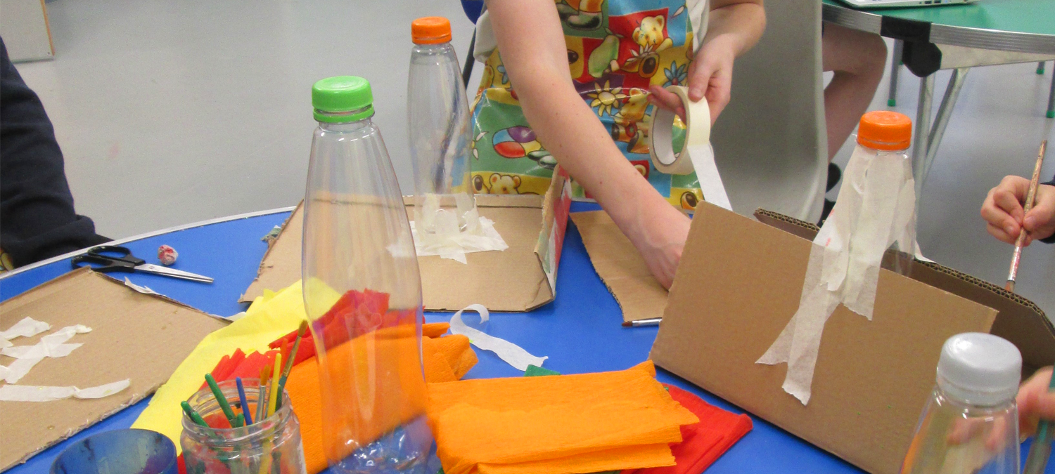 A child in kids clubs making craft items
