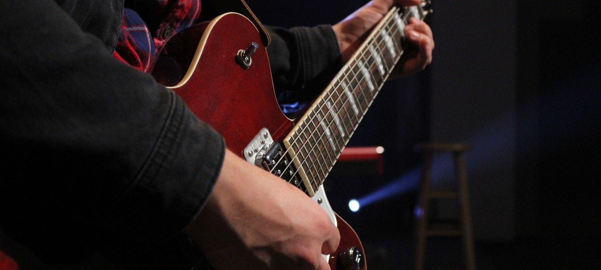 Musician playing electric guitar