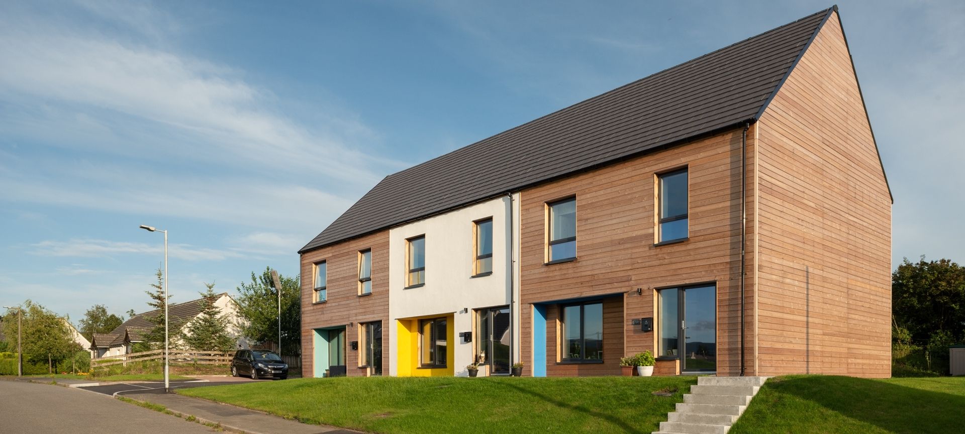 Artist impression of three new build terraced houses