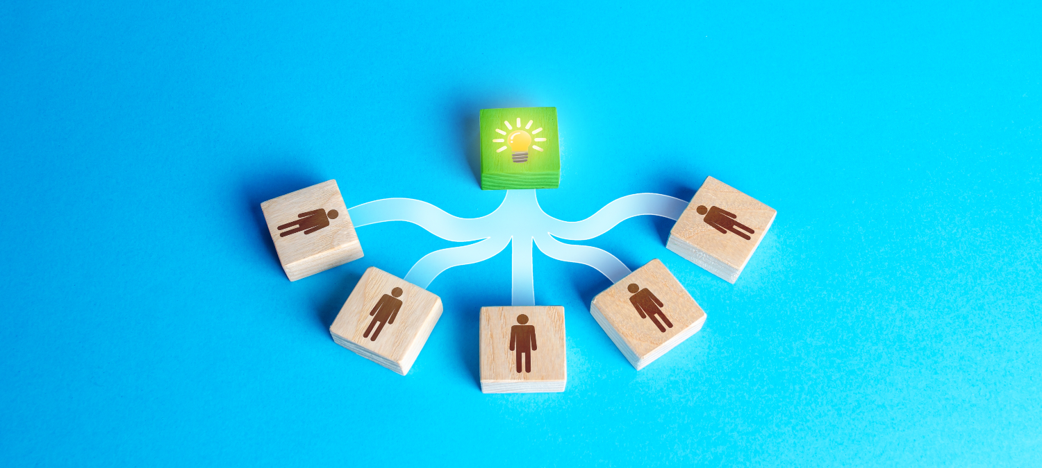 Wooden people having an idea