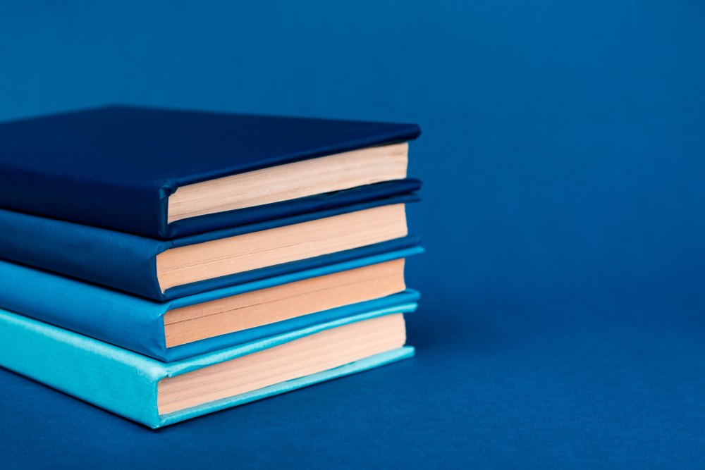 books against a blue background