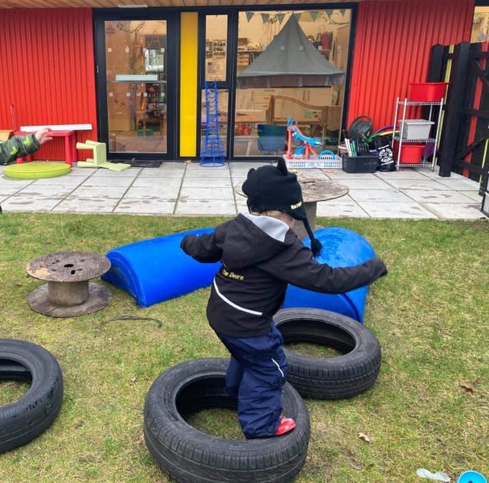 a child plays outside