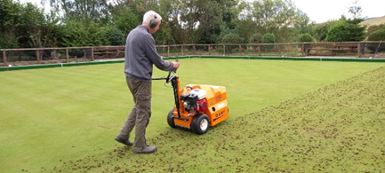 The multi-tined fine turf Aerator purchased with the grant in action on the green