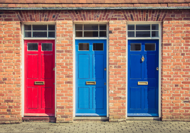 Three front doors - Coram Trust