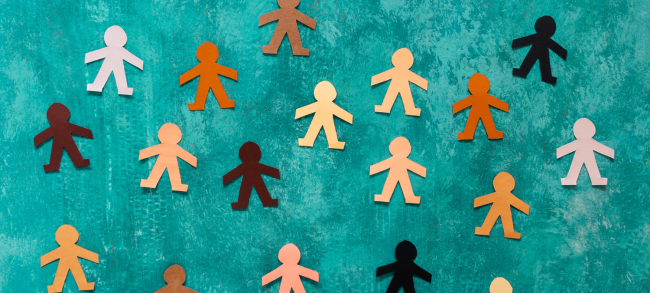 paper chain people on green